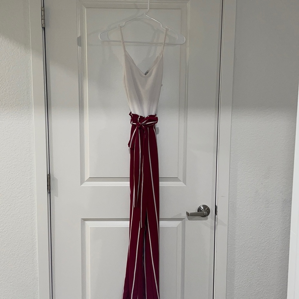 One piece, pin stripped body suit.